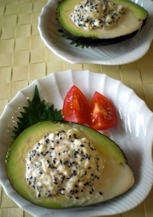 A picture of Avocado Salad Stuffed with Tofu.