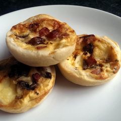 A picture of Sophie's bacon, brie and red onion tarts.