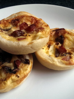 A picture of Sophie's bacon, brie and red onion tarts.