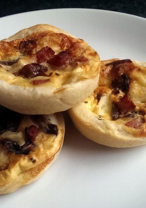 A picture of Sophie's bacon, brie and red onion tarts.