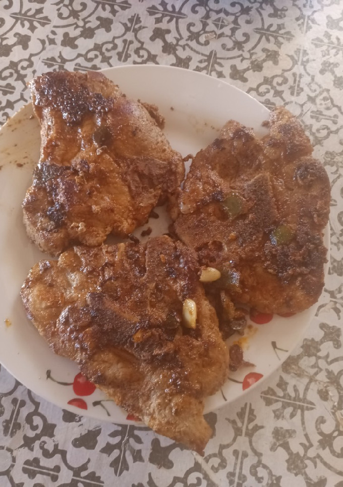A picture of Pan fried pork chops.