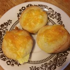 A picture of Bite sized cornbread quiches.