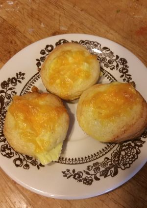 A picture of Bite sized cornbread quiches.
