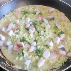 A picture of Make Takoyaki in a Frying Pan.