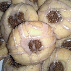 A picture of Raspberry Thumbprint Cookies With Lemon Icing.