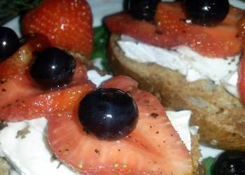 Unique Cuisine Sigs Berries over Goats Cheese Crostini Yummy