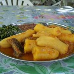 A picture of Bananas and vegetables.