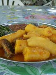 A picture of Bananas and vegetables.