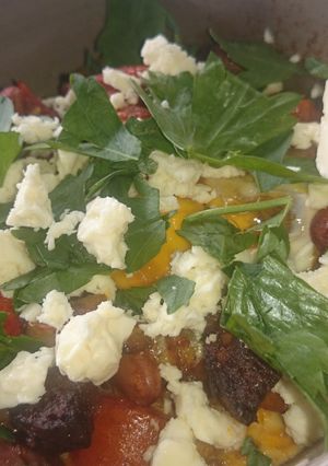 A picture of Baked eggs with chorizo and feta.