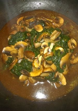 A picture of Sauteed spinach and mushrooms.