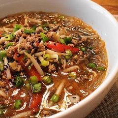 A picture of Healthy Dandan Noodles with Cellophane Noodles and Black Sesame.