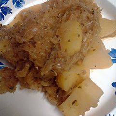 A picture of sauerkraut potatoes spices and herbs.
