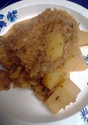 A picture of sauerkraut potatoes spices and herbs.