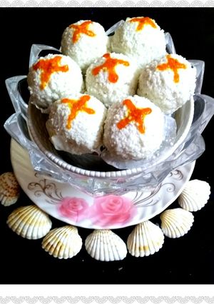A picture of Mango flavor Coconut Sandesh.