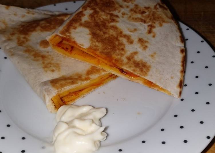 Steps to Make Super Quick Homemade My cheese and cherry tomato quesadilla