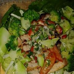 A picture of 3?flavours bbq pork with broccoli stems.