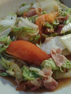 A picture of Chinese cabbage and bacon in oyster sauce.
