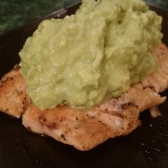 A picture of Grilled Salmon with Creamy Avocado Sauce.