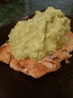 A picture of Grilled Salmon with Creamy Avocado Sauce.