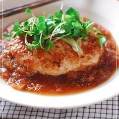 A picture of Minced Chicken and Tofu Hamburger Steaks with Grated Daikon and Ankake Sauce.