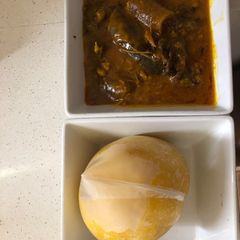 A picture of Ogbono soup and eba.