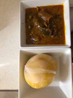 A picture of Ogbono soup and eba.
