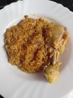 Una foto de Arroz meloso con Jamoncito de pollo