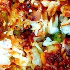 A picture of Red sauce pasta.
