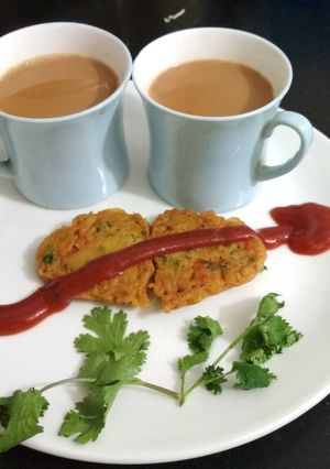 A picture of Veg Besan Chilla with Chai.
