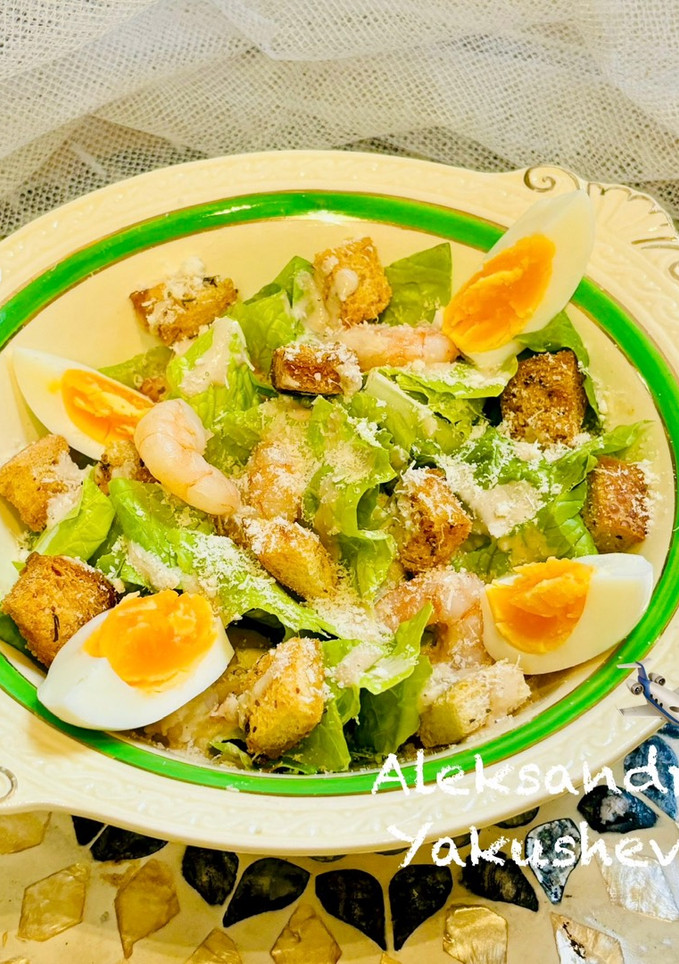A picture of Salad “Caesar” with shrimp 🦐.