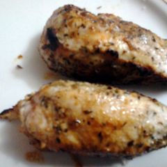 A picture of parmesan and herb crusted chicken.