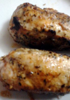 A picture of parmesan and herb crusted chicken.