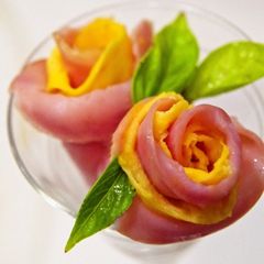 A picture of Flowers for Bento - Ham and Egg Roses - An Easy Bento Item.