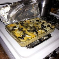 A picture of Soggy green enchiladas.