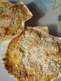 Una foto de Vieiras rellenas de merluza y gambas