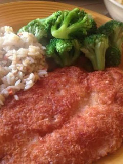 A picture of Panko fried chicken and siracha sauce!.