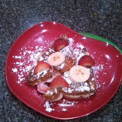 A picture of Strawberry Banana Stuffed French Toast.