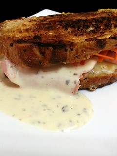 A picture of Ham And Cheese With Carrot Sandwich.