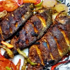 A picture of Indian style fried fish.