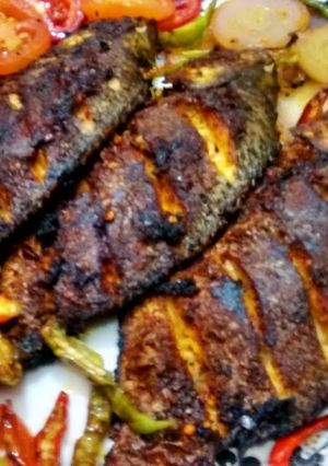 A picture of Indian style fried fish.