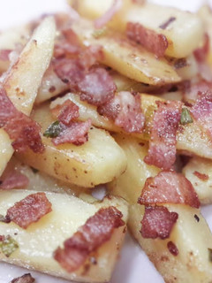 A picture of Bacon roasted potato wedges.