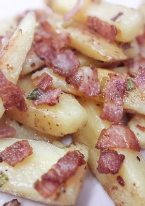 A picture of Bacon roasted potato wedges.