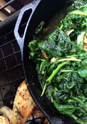 A picture of Skillet Spinach Over An Open Fire.