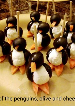 A picture of March of the penguins, olive and cheese bites.