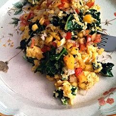 A picture of Kale and eggs.