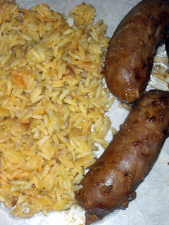 A picture of turkey sausage with rice.