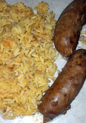 A picture of turkey sausage with rice.