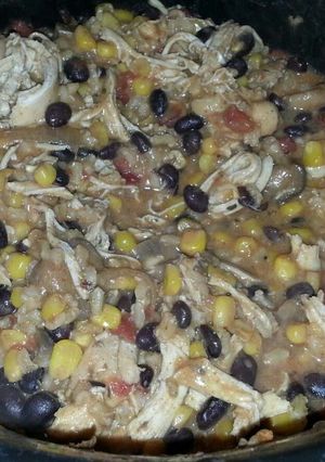 A picture of Mexican chicken and rice stew.