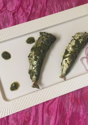 A picture of Steamed Fish in green gravy.