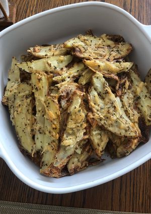 Una foto de Papas con parmesano 🥔🧀